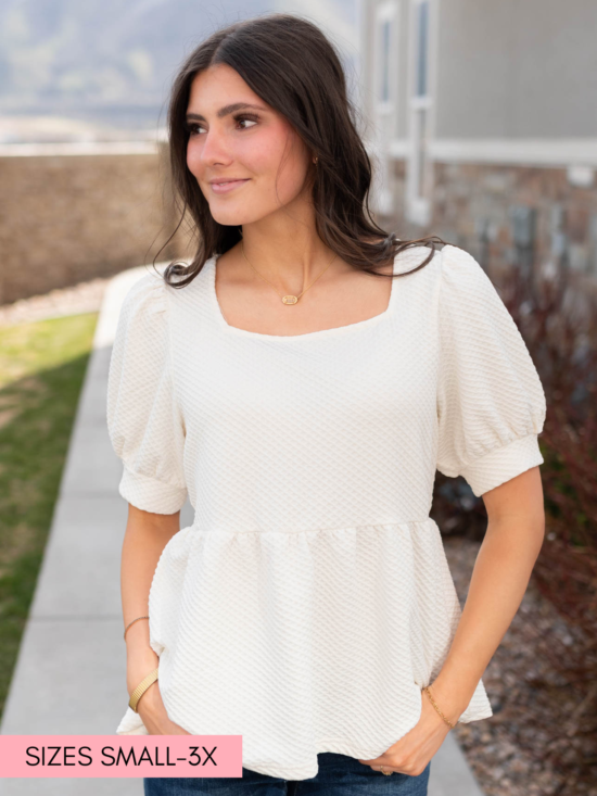 AngelinaCreamRuffleTop_e7f48888-d951-44be-b63b-83e0fd61be76.png Angelina Cream Ruffle Top