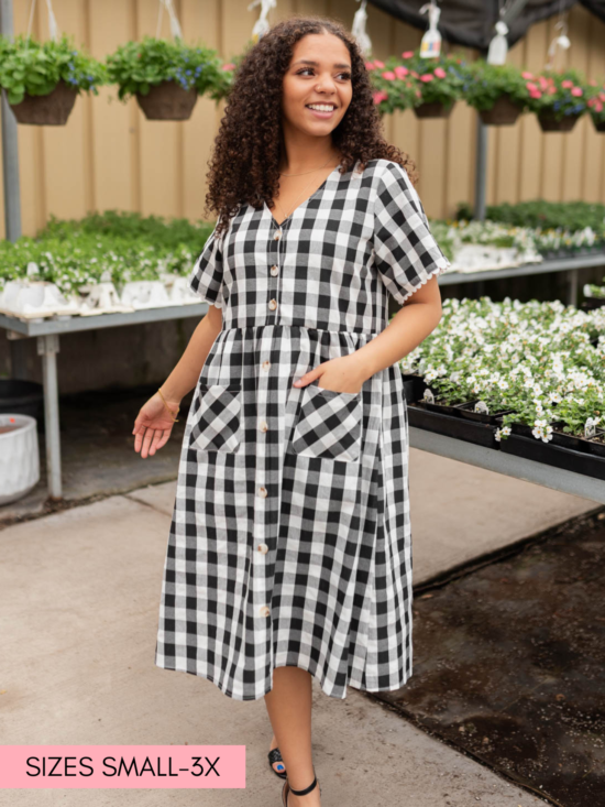 ArelieBlackGinghamButtonDress_8e04e108-a958-468b-adca-17cd5b3a0bbb.png Arelie Black Gingham Button Dress